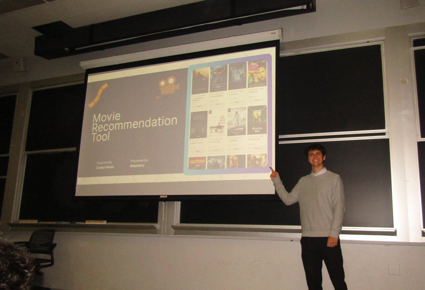 Casey presenting a Fall 2025 Junior Consultant Program final project at the semester showcase